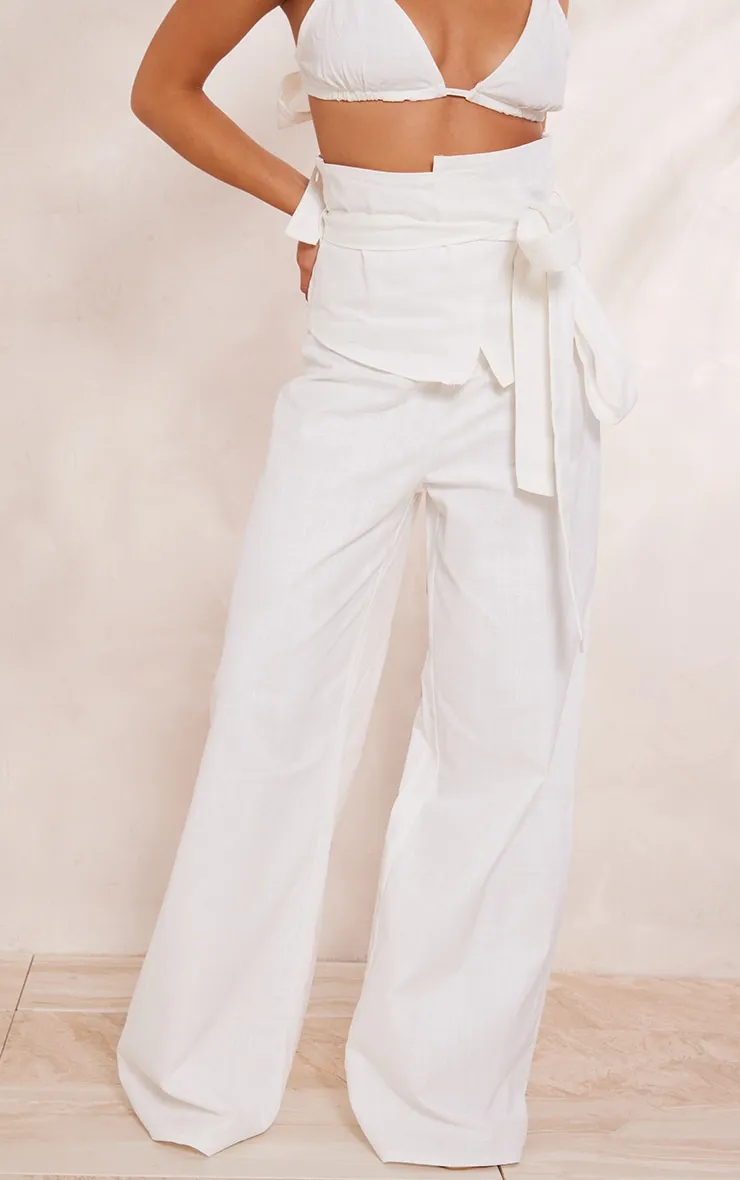 Pantalon oversize large en effet lin blanc à taille haute et ceinture