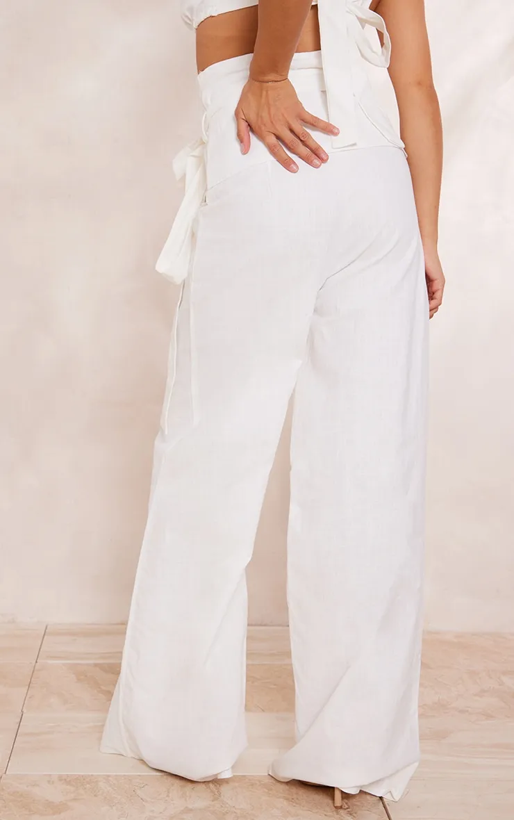 Pantalon oversize large en effet lin blanc à taille haute et ceinture