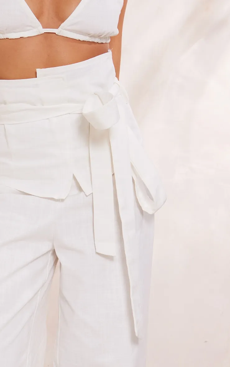 Pantalon oversize large en effet lin blanc à taille haute et ceinture