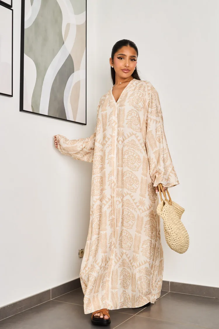 Robe beige à motifs blanc