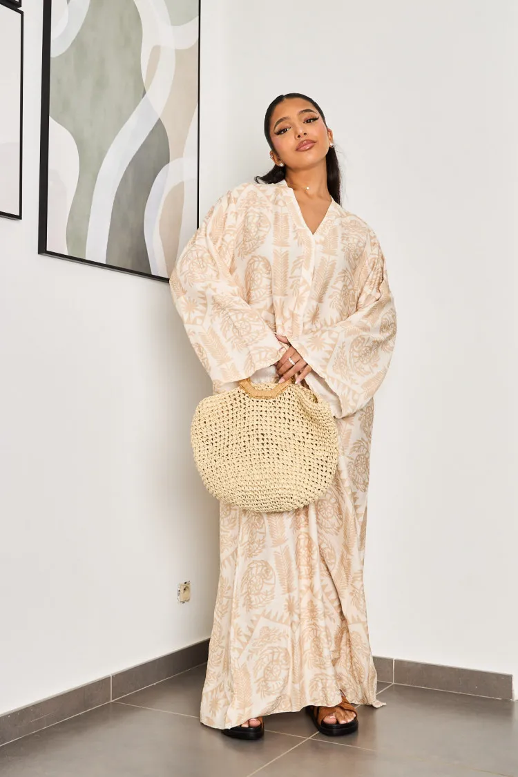 Robe beige à motifs blanc