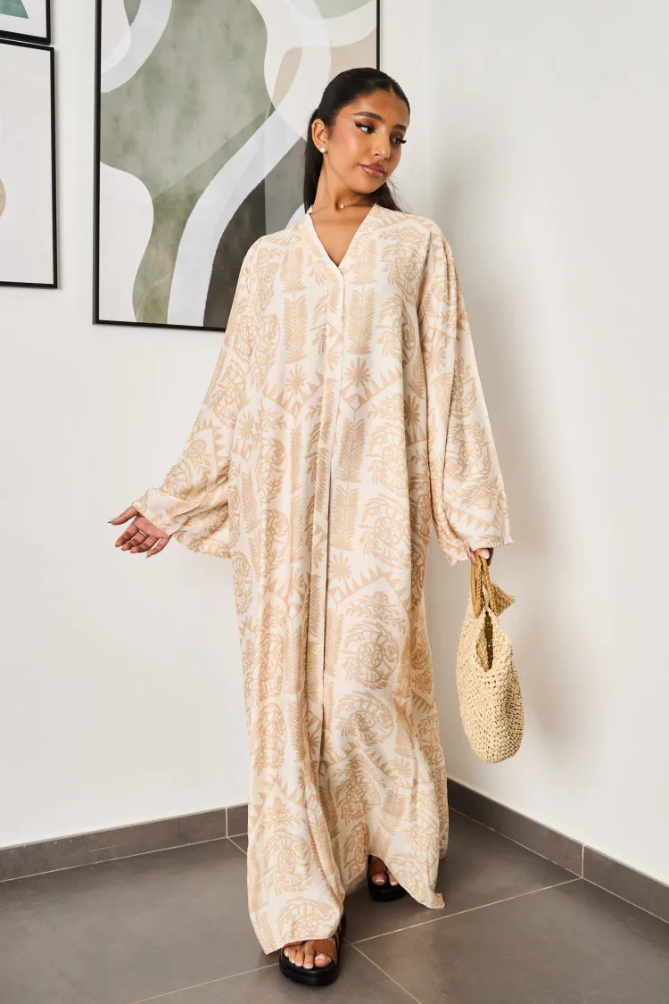 Robe beige à motifs blanc