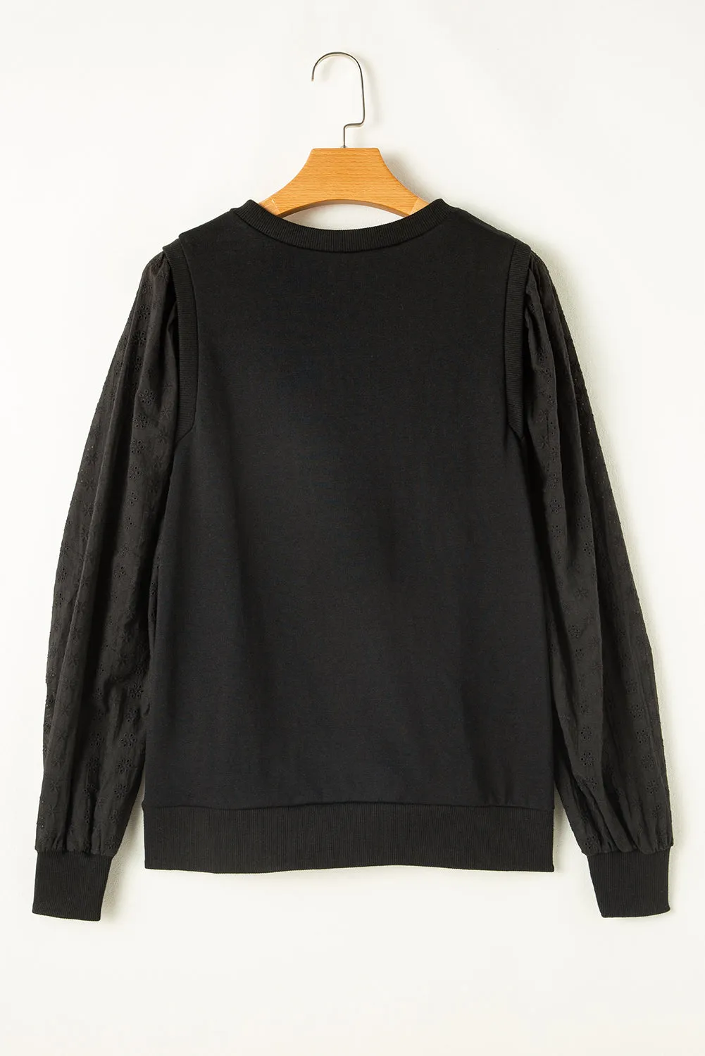 Sweat-shirt noir uni à manches patchwork et col rond