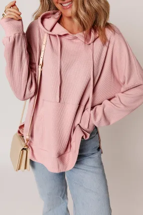 Sweat à capuche surdimensionné haut bas rose clair en tricot gaufré doublé de polaire