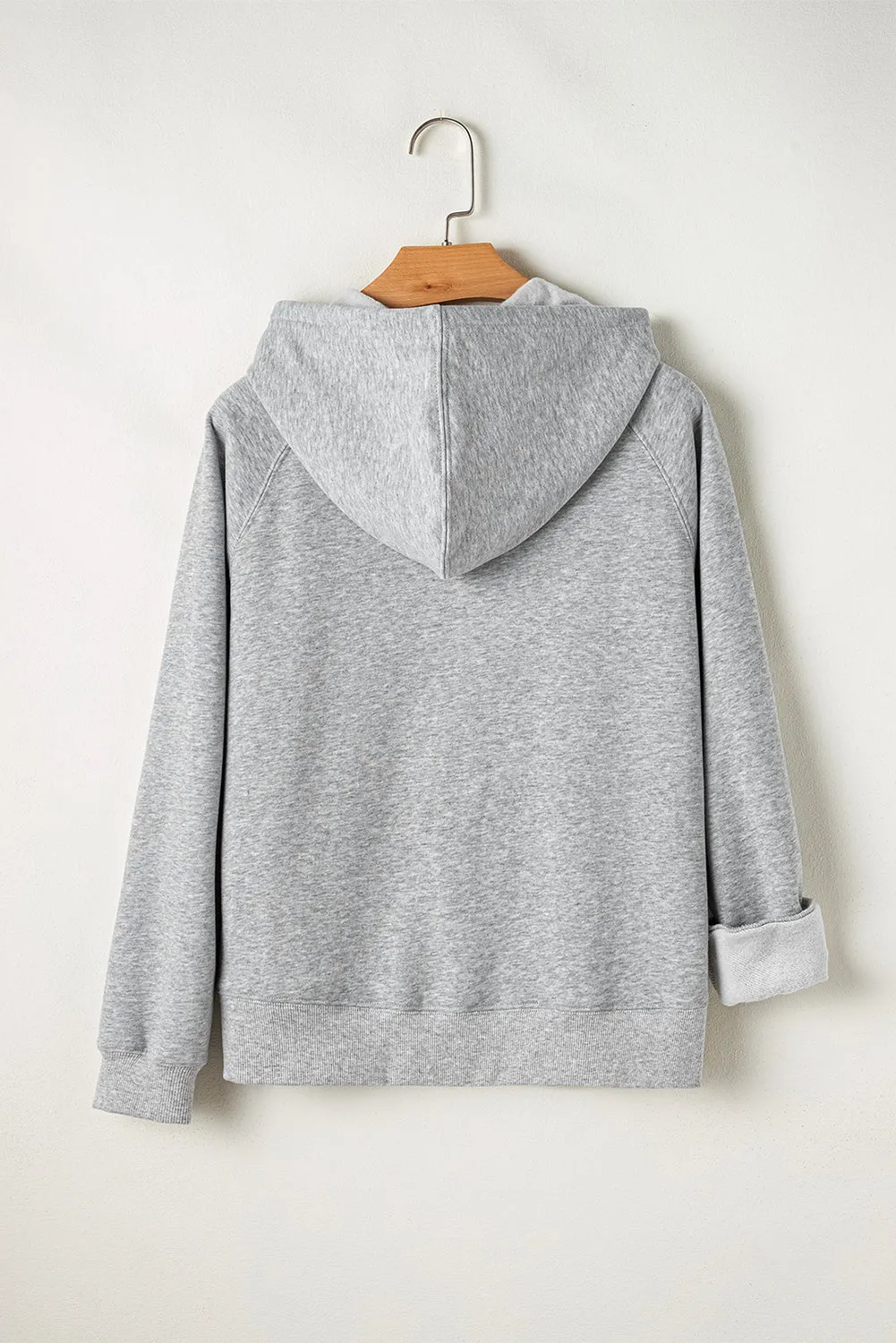 Sweat à capuche zippé gris clair doublé de polaire de couleur unie