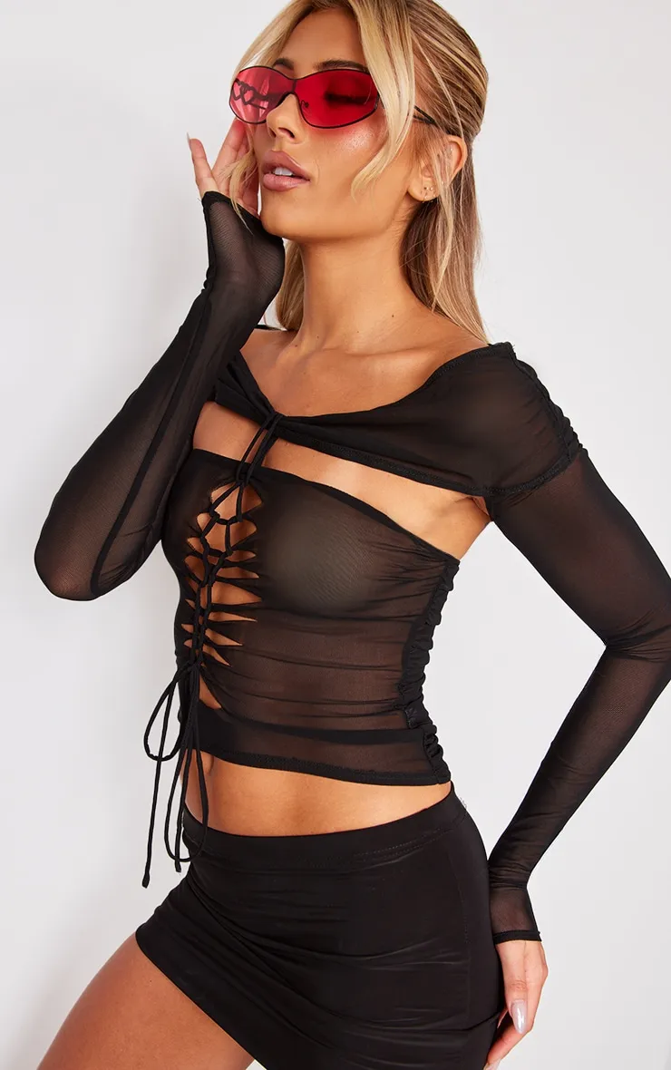 Top long en mesh noir à lacets